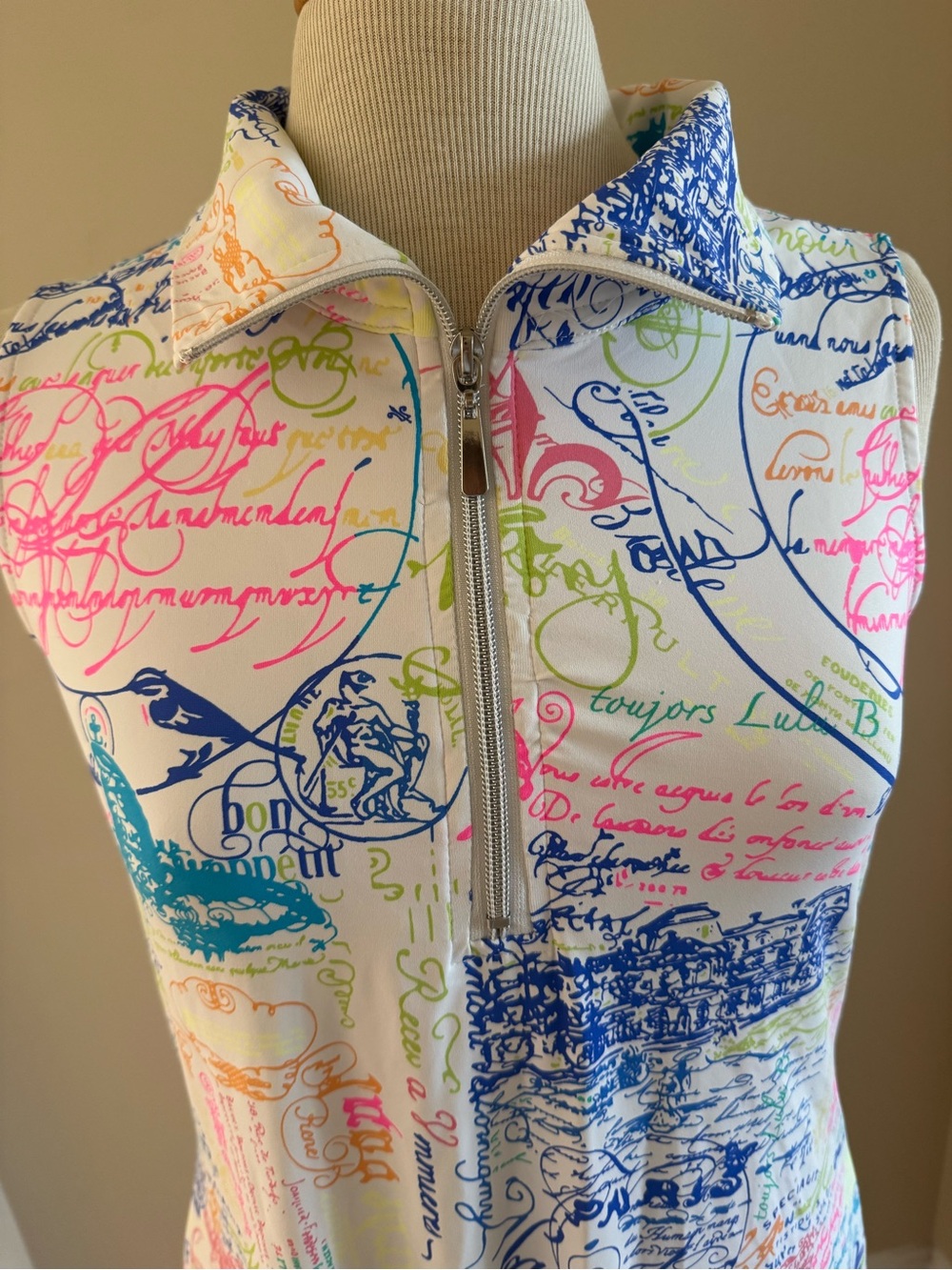 Sleeveless Zip Polo with Multicolor Script Print